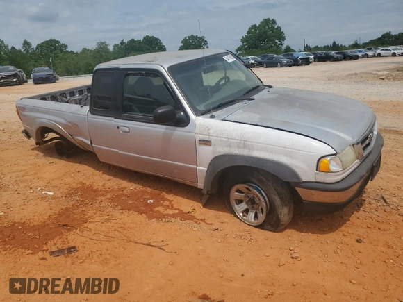 2003 Mazda B-Series Truck DS z VIN 4F4YR16V03TM05710, wystawiony jako Copart lot #54114605 z przebiegiem 187 857 mil mil oraz Szkoda całkowita • Salvage title. Historia ofert i sprzedaży dostępna na DreamBid. Obrazek 4.