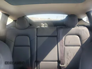 2024 Tesla Model Y с VIN 7SAYGDED2RF100152, выставлен на аукционе Copart как лот 52133535 с пробегом 7 632 миль миль и Списание • Salvage title. История ставок и продаж доступна на DreamBid. Изображение 10.