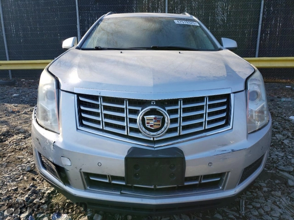 2014 Cadillac SRX Luxury Collection z VIN 3GYFNEE34ES641335, wystawiony jako Copart lot #47519325 z przebiegiem 124 407 mil mil oraz Szkoda całkowita • Salvage title. Historia ofert i sprzedaży dostępna na DreamBid. Obrazek 5.