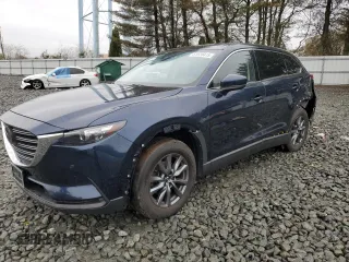 2020 Mazda CX-9 Touring z VIN JM3TCBCY6L0401808, wystawiony jako Copart lot #51520475 z przebiegiem 72 917 mil mil oraz Szkody całkowita. Historia ofert i sprzedaży dostępna na DreamBid. Obrazek 1.