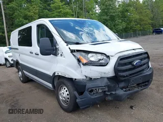 2020 Ford Transit Cargo z VIN 1FTBR2Y80LKB22354, wystawiony jako IAAI lot #42347579 z przebiegiem 64 513 mil mil oraz . Historia ofert i sprzedaży dostępna na DreamBid. Obrazek 1.