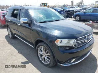 2014 Dodge Durango Citadel z VIN 1C4RDHEG7EC300852, wystawiony jako IAAI lot #42007888 z przebiegiem 128 662 mil mil oraz . Historia ofert i sprzedaży dostępna na DreamBid. Obrazek 1.