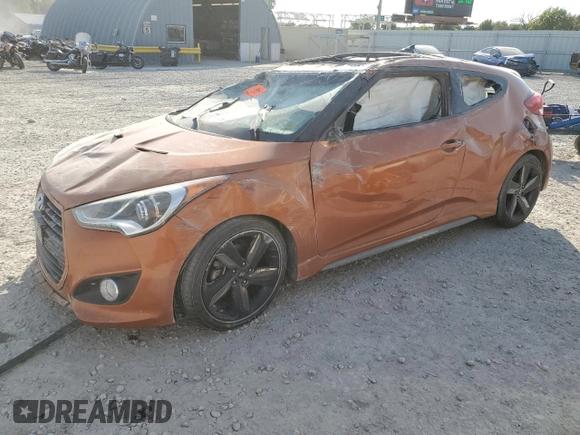 2015 Hyundai Veloster Turbo z VIN KMHTC6AE4FU232597, wystawiony jako Copart lot #74137024 z przebiegiem Nie podano mil oraz Szkoda całkowita • Salvage title. Historia ofert i sprzedaży dostępna na DreamBid. Obrazek 1.