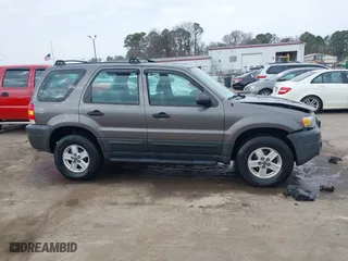 2005 Ford Escape XLS Value with VIN 1FMYU92Z35KA20497, listed as a IAAI auction lot 41509893 with 149,866 mi miles. Bid and sale history available at carsss.com. Image 13.