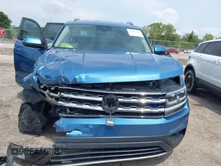 2019 Volkswagen Atlas SE z VIN 1V2WR2CA5KC524650, wystawiony jako IAAI lot #42217791 z przebiegiem 92 571 mil mil oraz . Historia ofert i sprzedaży dostępna na DreamBid. Obrazek 11.