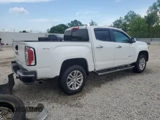 2019 GMC Canyon 4WD SLT with VIN 1GTG6DEN8K1274729, listed as a Copart auction lot 60804575 with 107,382 mi miles and Salvage title. Bid and sale history available at DreamBid. Image 3.