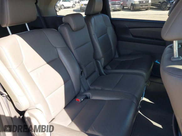 2012 Honda Odyssey Touring with VIN 5FNRL5H9XCB077351, listed as a IAAI auction lot 42045976 with 146,290 mi miles and . Bid and sale history available at DreamBid. Image 8.
