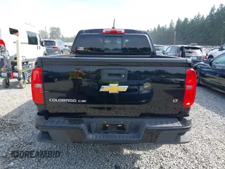2020 Chevrolet Colorado 4WD LT with VIN 1GCGTCEN5L1233382, listed as a IAAI auction lot 42489220 with 61,949 mi miles and . Bid and sale history available at DreamBid. Image 16.