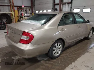 2003 Toyota Camry LE with VIN 4T1BE32K73U136399, listed as a IAAI auction lot 41877554 with 235,078 mi miles and . Bid and sale history available at DreamBid. Image 4.