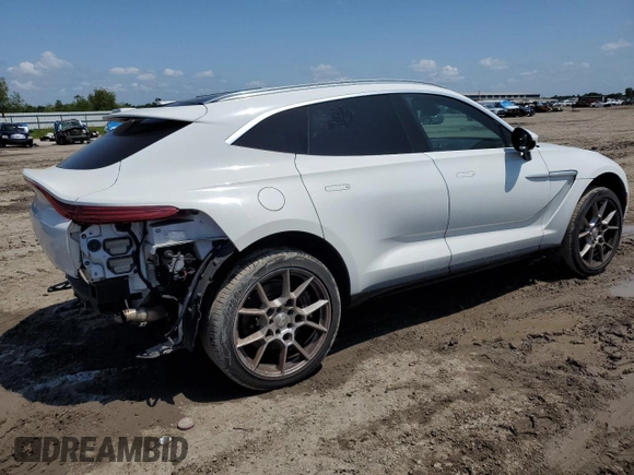 2021 Aston Martin DBX z VIN SCFVUJAW8MTV02781, wystawiony jako Copart lot #56249665 z przebiegiem 19 901 mil mil oraz Szkoda całkowita • Salvage title. Historia ofert i sprzedaży dostępna na DreamBid. Obrazek 3.