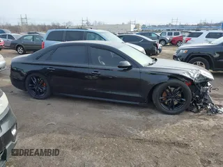 2016 Audi A8 L 4.0T Sport with VIN WAU43AFDXGN005323, listed as a IAAI auction lot 41311344 with 84,000 mi miles. Bid and sale history available at carsss.com. Image 13.
