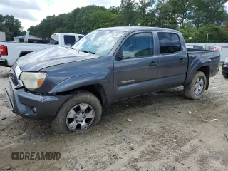 2014 Toyota Tacoma with VIN 3TMLU4EN4EM158214, listed as a Copart auction lot 63961895 with 374,855 mi miles and Salvage title. Bid and sale history available at DreamBid. Image 1.