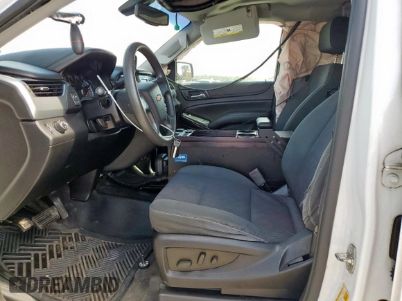 2015 Chevrolet Tahoe Commercial with VIN 1GNLC2EC4FR590119, listed as a Copart auction lot 62159795 with 93,021 mi miles and Salvage title. Bid and sale history available at DreamBid. Image 7.