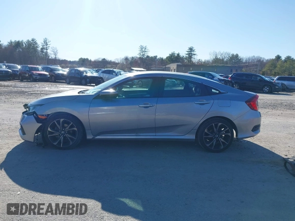 2019 Honda Civic Sport with VIN 2HGFC2F8XKH602463, listed as a IAAI auction lot 41966052 with 95,416 mi miles and . Bid and sale history available at DreamBid. Image 14.