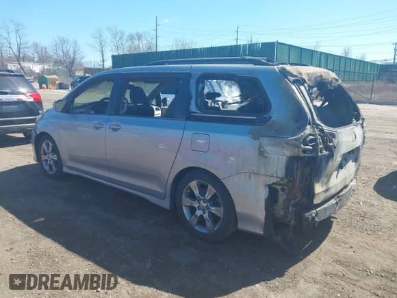 2012 Toyota Sienna SE with VIN 5TDXK3DC0CS235644, listed as a IAAI auction lot 41894016 with 118,487 mi miles. Bid and sale history available at carsss.com. Image 3.