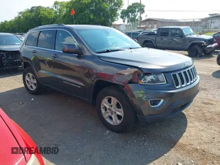 2016 Jeep Grand Cherokee Laredo with VIN 1C4RJEAG1GC306792, listed as a IAAI auction lot 42657440 with 113,817 mi miles and . Bid and sale history available at DreamBid. Image 1.