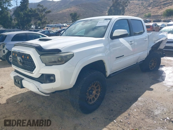 2018 Toyota Tacoma SR5 with VIN 3TMDZ5BN2JM037580, listed as a IAAI auction lot 42248418 with 35,661 mi miles and . Bid and sale history available at DreamBid. Image 16.