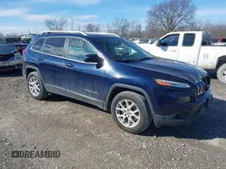2014 Jeep Cherokee Latitude z VIN 1C4PJMCS6EW145810, wystawiony jako IAAI lot #41802031 z przebiegiem 143 358 mil mil oraz . Historia ofert i sprzedaży dostępna na DreamBid. Obrazek 1.