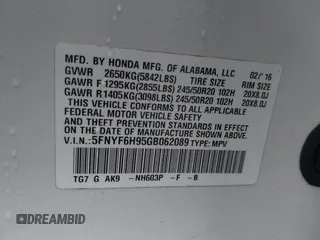 2016 Honda Pilot Touring with VIN 5FNYF6H95GB062089, listed as a IAAI auction lot 41810378 with 74,704 mi miles and . Bid and sale history available at DreamBid. Image 9.