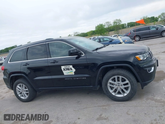 2018 Jeep Grand Cherokee Laredo E with VIN 1C4RJFAG6JC335606, listed as a IAAI auction lot 42280666 with 113,438 mi miles and . Bid and sale history available at DreamBid. Image 13.