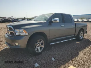 2012 Ram 1500 Laramie Longhorn with VIN 1C6RD7PT1CS329388, listed as a Copart auction lot 46707665 with 121,874 mi miles and Salvage title. Bid and sale history available at DreamBid. Image 1.