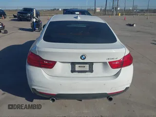 2015 BMW 4 Series 435i with VIN WBA4B1C59FD955497, listed as a IAAI auction lot 41174096 with 101,047 mi miles and . Bid and sale history available at carsss.com. Image 16.