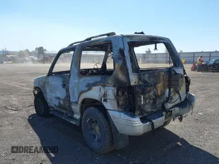 1991 Mitsubishi Montero z VIN 2BG70124X43000753, wystawiony jako IAAI lot #42055421 z przebiegiem Nie podano mil oraz . Historia ofert i sprzedaży dostępna na DreamBid. Obrazek 3.