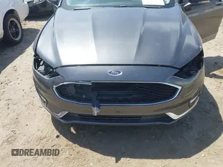 2019 Ford Fusion Titanium with VIN 3FA6P0D9XKR152617, listed as a IAAI auction lot 42209470 with 135,956 mi miles and . Bid and sale history available at DreamBid. Image 6.