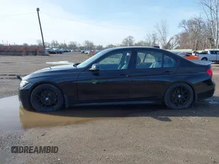 2015 BMW 3 Series 328i xDrive with VIN WBA3B3C51FF548592, listed as a IAAI auction lot 41941167 with 87,124 mi miles. Bid and sale history available at carsss.com. Image 14.