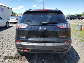 2022 Jeep Cherokee Trailhawk with VIN 1C4PJMBX8ND543366, listed as a Copart auction lot 55805195 with 61,926 mi miles and Salvage title. Bid and sale history available at DreamBid. Image 6.