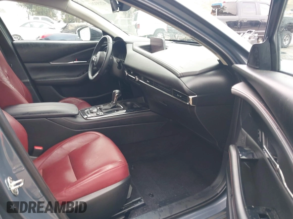 2022 Mazda CX-30 S Carbon Edition with VIN 3MVDMBCL0NM456154, listed as a IAAI auction lot 42153202 with 40,372 mi miles and . Bid and sale history available at DreamBid. Image 5.