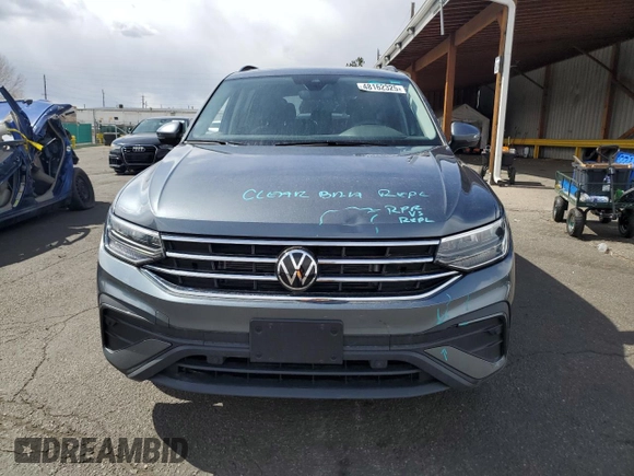 2024 Volkswagen Tiguan S with VIN 3VVFB7AX6RM010391, listed as a Copart auction lot 48162325 with 9,715 mi miles and Salvage title. Bid and sale history available at DreamBid. Image 5.