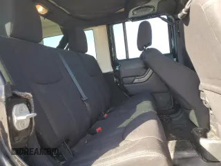 2013 Jeep Wrangler Unlimited Freedom z VIN 1C4BJWDG0DL513902, wystawiony jako Copart lot #52045975 z przebiegiem 166 827 mil mil oraz Szkoda całkowita • Salvage title. Historia ofert i sprzedaży dostępna na DreamBid. Obrazek 10.