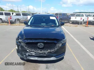 2018 Mazda CX-5 Touring z VIN JM3KFACM5J0309533, wystawiony jako IAAI lot #42195429 z przebiegiem 91 928 mil mil oraz . Historia ofert i sprzedaży dostępna na DreamBid. Obrazek 12.