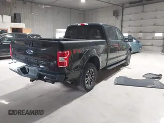 2018 Ford F-150 XL with VIN 1FTFW1E56JFD06640, listed as a IAAI auction lot 41983563 with 63,092 mi miles. Bid and sale history available at carsss.com. Image 4.