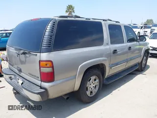 2002 Chevrolet Suburban LT z VIN 1GNFK16T92J208121, wystawiony jako IAAI lot #42163490 z przebiegiem 177 145 mil mil oraz . Historia ofert i sprzedaży dostępna na DreamBid. Obrazek 4.