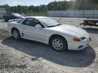 1996 Mitsubishi 3000GT GT z VIN JA3AM84J7TY005775, wystawiony jako Copart lot #70461554 z przebiegiem 102 704 mil mil oraz Tytuł czysty. Historia ofert i sprzedaży dostępna na DreamBid. Obrazek 4.