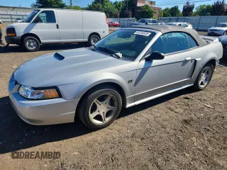 2000 Ford Mustang GT с VIN 1FAFP45X7YF265824, выставлен на аукционе Copart как лот 65204825 с пробегом 69 117 миль миль и Списание • Salvage title. История ставок и продаж доступна на DreamBid. Изображение 1.