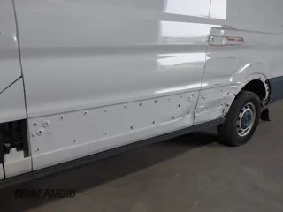2019 Ford Transit with VIN 1FTBW2CM6KKB73059, listed as a IAAI auction lot 42143526 with 114,147 mi miles. Bid and sale history available at carsss.com. Image 6.