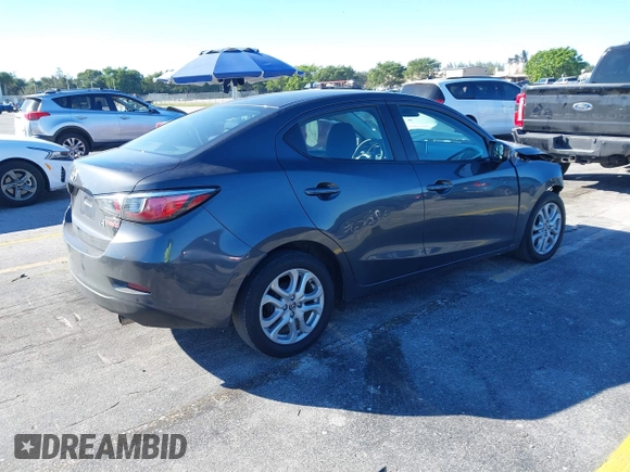 2016 Scion iA with VIN 3MYDLBZV5GY142378, listed as a IAAI auction lot 41274960 with 123,807 mi miles. Bid and sale history available at carsss.com. Image 4.