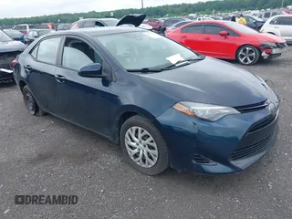 2018 Toyota Corolla L with VIN 2T1BURHEXJC003674, listed as a IAAI auction lot 42511551 with 184,697 mi miles and . Bid and sale history available at DreamBid. Image 1.