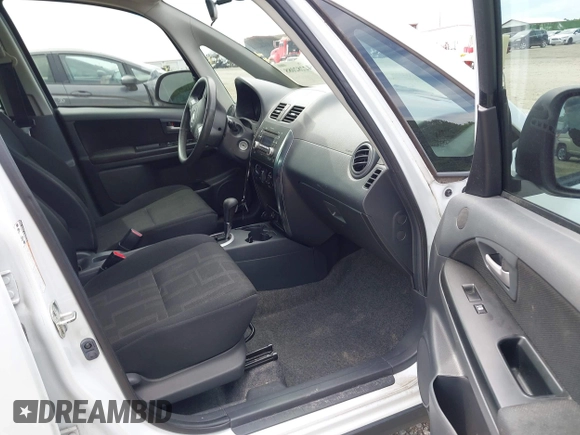 2012 Suzuki SX4 Crossover z VIN JS2YB5A35C6304967, wystawiony jako IAAI lot #42282088 z przebiegiem 152 232 mil mil oraz . Historia ofert i sprzedaży dostępna na DreamBid. Obrazek 5.