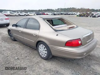 2003 Mercury Sable GS z VIN 1MEFM50U33A606937, wystawiony jako IAAI lot #41058899 z przebiegiem 138 479 mil mil oraz . Historia ofert i sprzedaży dostępna na DreamBid. Obrazek 3.