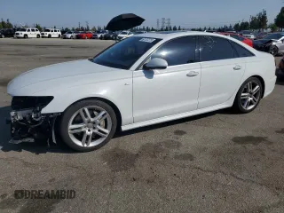 2016 Audi A6 Premium Plus with VIN WAUGFAFC5GN176850, listed as a Copart auction lot 60137275 with 112,770 mi miles and Salvage title. Bid and sale history available at DreamBid. Image 1.