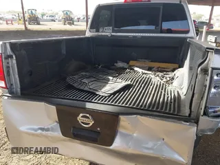 2011 Nissan Titan SV with VIN 1N6BA0ED6BN324977, listed as a IAAI auction lot 41275371 with 290,967 mi miles and . Bid and sale history available at DreamBid. Image 6.