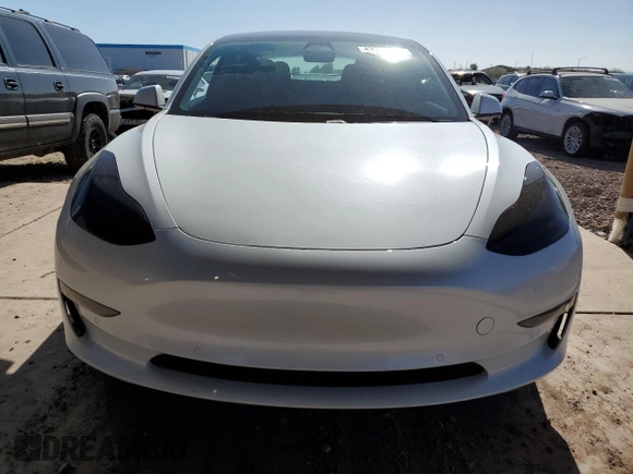 2021 Tesla Model 3 Standard Range Plus with VIN 5YJ3E1EA7MF978749, listed as a Copart auction lot 43377955 with 51,871 mi miles and Salvage Title. Bid and sale history available at carsss.com. Image 5.
