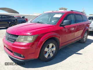 2013 Dodge Journey SE with VIN 3C4PDCAB1DT555181, listed as a IAAI auction lot 42834864 with 152,615 mi miles and . Bid and sale history available at DreamBid. Image 2.