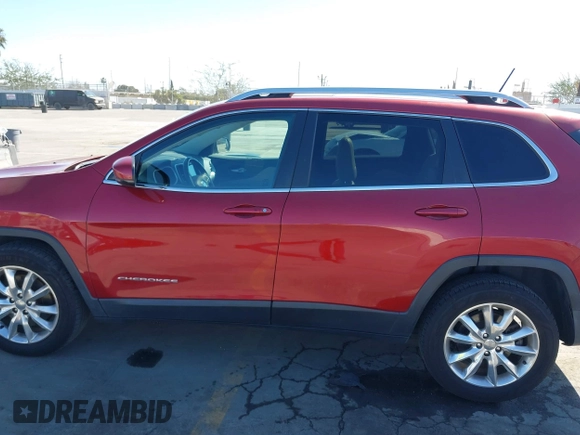 2015 Jeep Cherokee Limited with VIN 1C4PJMDB1FW599205, listed as a IAAI auction lot 41709308 with 112,415 mi miles. Bid and sale history available at carsss.com. Image 14.