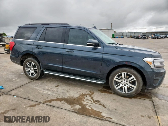 2022 Ford Expedition XLT with VIN 1FMJU1HT5NEA48449, listed as a Copart auction lot 61662065 with 31,418 mi miles and Salvage title. Bid and sale history available at DreamBid. Image 4.