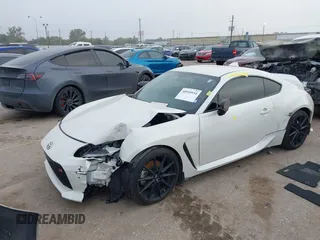 2023 Toyota GR86 Premium with VIN JF1ZNBF16P8756664, listed as a IAAI auction lot 40910934 with 9,055 mi miles. Bid and sale history available at carsss.com. Image 2.